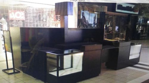 Mall kiosk and 6 wall thropy cases like new in excellent shape! for sale