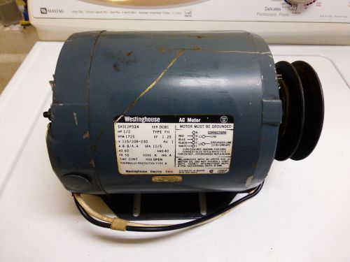 Westinghouse 1/2 horse electric motor with pulley and mounting base for sale