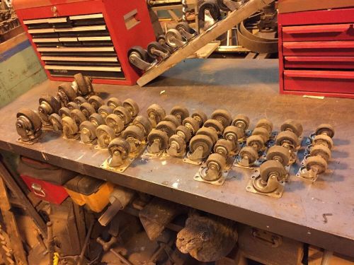 13 sets of industrial vintage utility casters up to 5 1/2 inches tall for sale