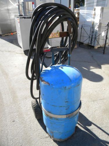 Well-x-trol water tank w cart and hose assembly -used- as is for sale