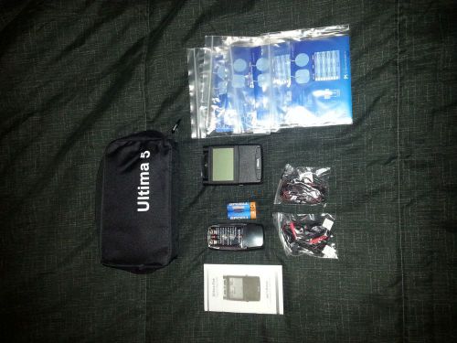 ULTIMA 5 TENS UNIT AND 4 SETS OF PADS NEVER USED