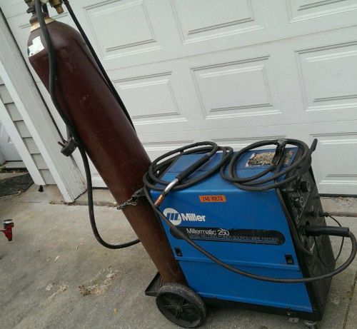 Miller millermatic 250 wire feed mig welder with full tank for sale