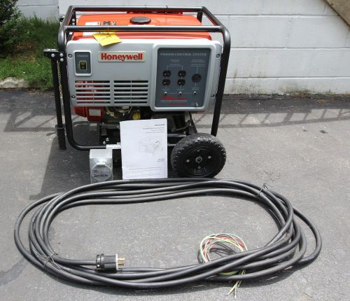 7000 watt honeywell generator, battery, cable, very low hours for sale