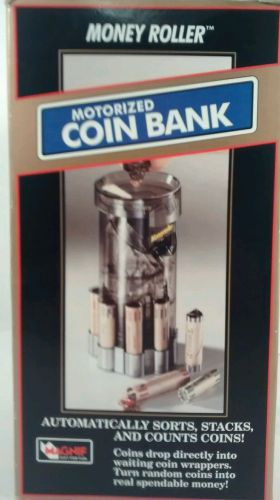 Money roller- motorized coin bank- ( magnif brand )w/operating instructions for sale