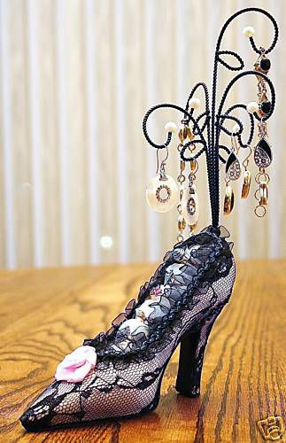 Fanciful black and pink lacy shoe jewelry display for sale