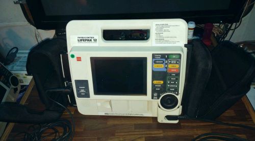 Lifepak 12 Biphasic Monitor with 3 ECG cord, carrying case, Adult/Child paddles