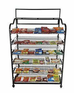 Returned item! 39&#034; Wide Bakery Display Rack Wheels Adjustable Shelves Header