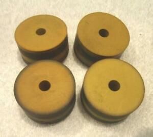 (4 )1-9/16&#034; RUBBER DRIVE PULLEYS/WHEELS-13/16&#034; WIDE WITH A 5/16&#034; CENTER WITH HUB