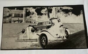 2 Photo Negatives for Newspaper Printing, Woman Standing By Vintage Model A Car
