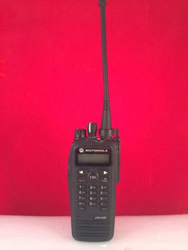 Motorola xpr6580 uhf radio with new motorola impres charger for sale