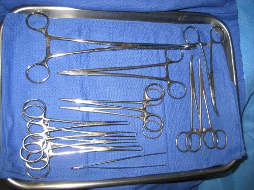 Stainless steel twelve (12) piece surgical set with autoclavable tray for sale