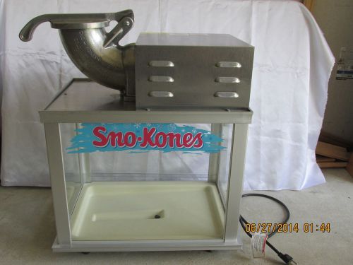 Snow kone machine # 1003 - 1/3hp motor to carve up to 500 lb of Ice per hour.