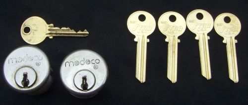 2 MEDECO   mortise cylinders    with 1 working key and 4 key blanks