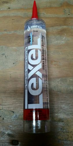 Lot of 12. Lexel Clear Adhesive Caulk  10.5 oz.