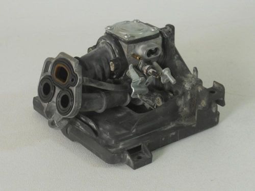 Carburetor &amp; Intake Manifold Assembly from a Husqvarna K760