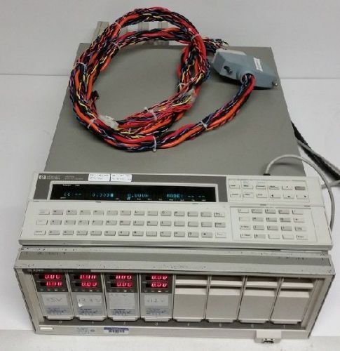 Agilent hp 66000a (66001a) mainframe, (4) 5060-3386 modules &amp; mps keyboard for sale