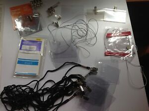 Assortment of name ID convention badge holders,some with lanyards, and name tags