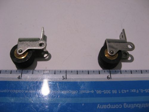 Lot of 2 pinch roller rubber w. steel bracket 1/2 in dia 1/4 in wide - nos for sale