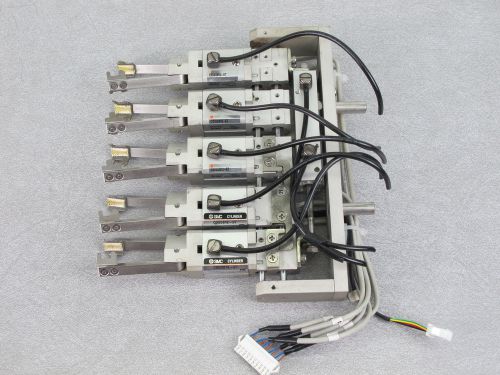 Smc cdqsb12-5t lot of 5 pneumatic cylinders w/ grippers &amp; cdu10-40-dch372eh for sale