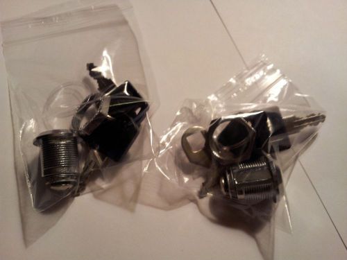 (2) alliance 5/8 cam locks for cabinets, drawers, mail box, etc.. 4 black keys for sale