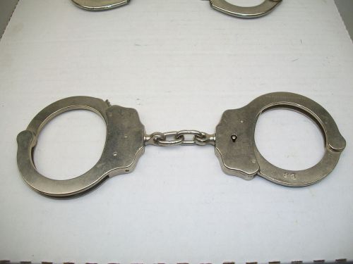 Vintage the peerless handcuff co. handcuffs patent #1531451-1872857 usa for sale