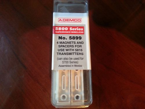 Ademco 5899 4 magnets and spacers for 5616 transmitters *** new in box** for sale