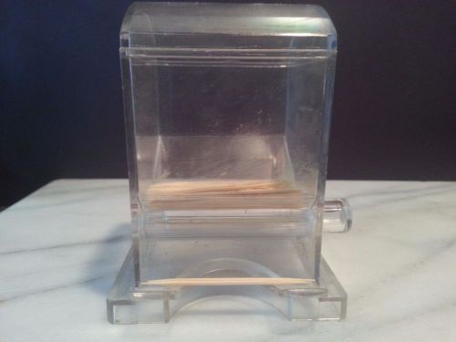 Plastic rolling barrel style toothpick dispenser clear plastic top lid lifts off for sale