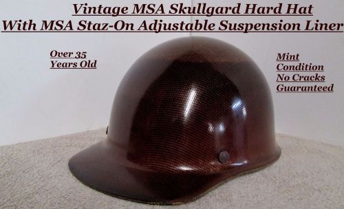Msa skullgard  hard hat, dark brown, msa staz-on suspension liner included for sale