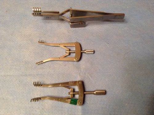 SKIN RETRACTORS QUANTITY 3, ONE RATCHET, 2 THUMB SCREW ONE NEW THUMB SCREW