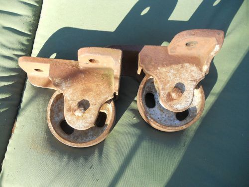 Pair(2) antique vtg heavy cast iron fixed wheels safe industrial cart steampunk for sale