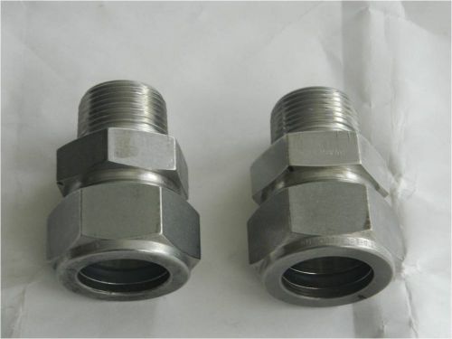 Two stainless steel swagelok fittings 3/4 NPT to 1&#034; tube