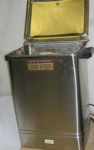 Used hydrocollator e-1 (working), 4  hot packs (used), commercial grade for sale