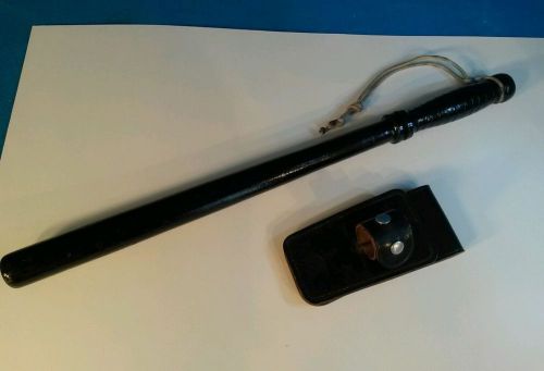 Black police baton w/leather holster, 22&#034; long, very good condition!
