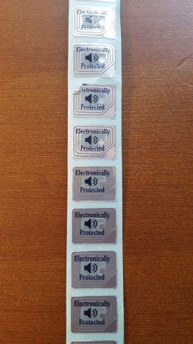 Small labels &#034;electronically protected&#034; dummy,  1 roll of 5,000 for sale