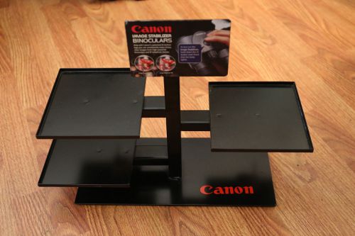 Canon official retail store display shelf camera binoculars security cable photo for sale