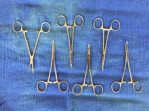 USED SURGICAL (CURVED) HEMOSTATS