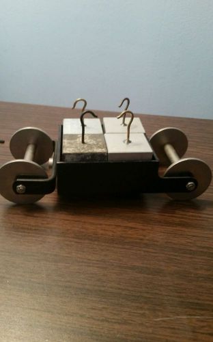 Set of 4 balanace weights in carriage