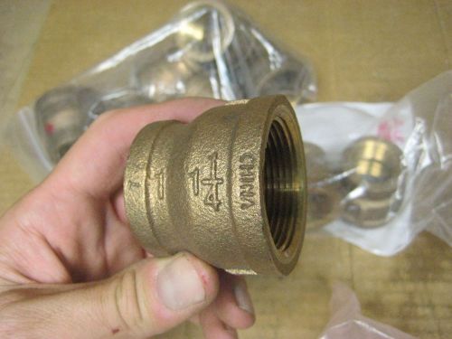 Cast brass or bronze 1-1/4&#034; to 1&#034; reducer pipe fitting, lot of (11) for sale