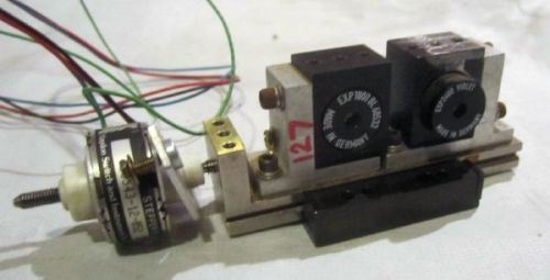 Small translation stage, 2 german made laser lens.  driven by stepper motor for sale