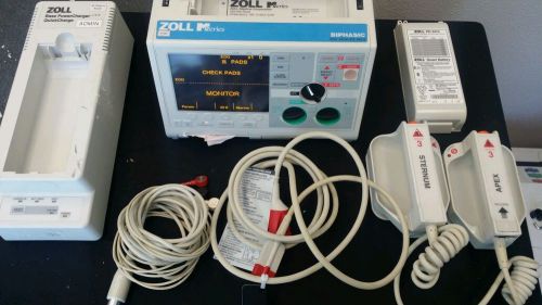 Zoll m series biphasic w/ ecg &amp; mfc cables &amp; paddles ,battery, external charger for sale
