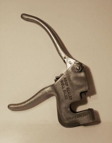 VINTAGE 1943 + BEEF EAR TAG APPLICATOR TOOL +   SECURITY SEAL CO + PATENTED