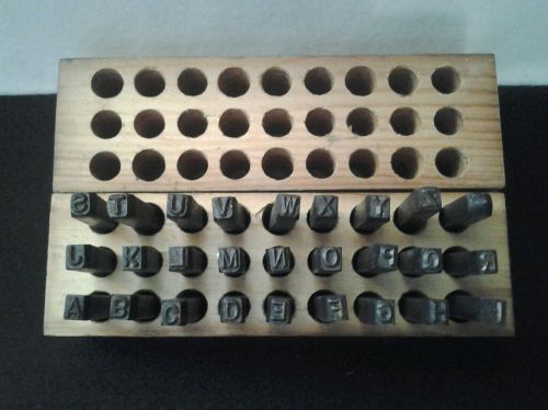 Vintage steel alphabet stamp set