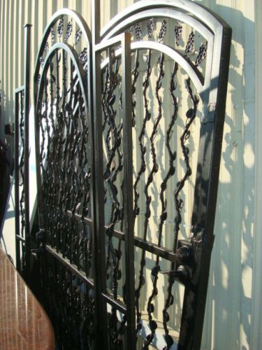 CUSTOM WROUGHT IRON GATES w/GRAPE VINE MOTIF 56&#034;w X 90&#034;h USED IN A WINE BAR