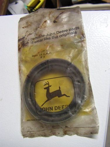 John Deere #AW12808 hydraulic seal. New in original sealed packaging.