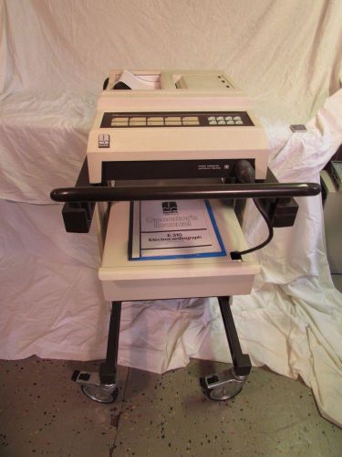 Used Burdick E310 electrocardiograph with rolling cart &amp; accessories
