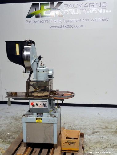 Used- West PW300 Rotary Flip Off Capper capable of up to 120 bottles per minute.