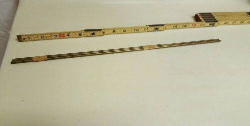 4 Pieces 1/8&#034; round 18&#034; long solid brass rods. Plus two 12&#034; rods TOTAL 6
