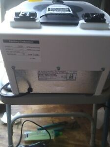 LabCorp Centrifuge Model 642E with medical equipment and supplies.