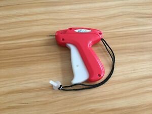 Portable clothing price tag gun with barb clothing tag gun