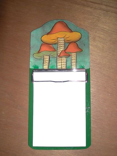 Wooden note pad painted colorfully with mushrooms